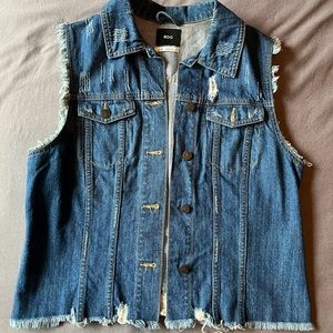 SUPER cute distressed denim vest!